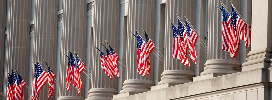 Flags on a building in Washington, D.C.